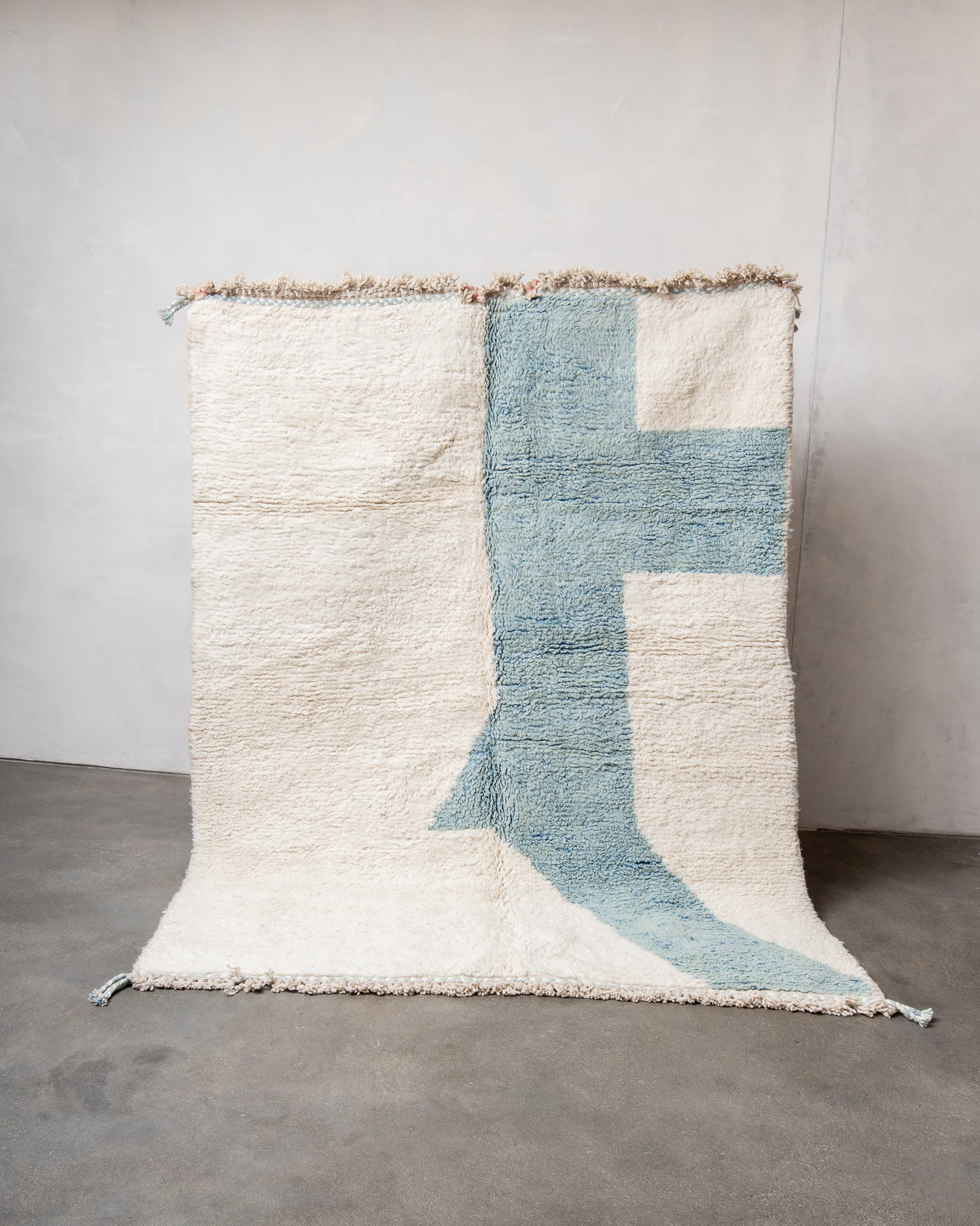 Modern, designer, handcrafted Berber rug from Morocco. Beniourain carpet with beautiful colours and patterns and fluffy wool texture.